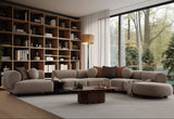 Canapea Aura cu design organic și colțuri rotunjite, tapițerie textilă bej, potrivită pentru living elegant