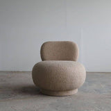 Fotoliu boucle pouf crem cu aspect minimalist si volum generos