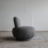 Fotoliu boucle pouf crem cu aspect minimalist si volum generos