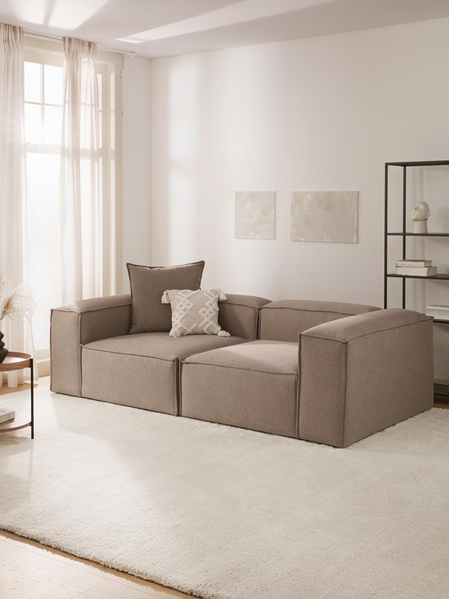 Canapea modulara Frame Calm amplasata in living modern